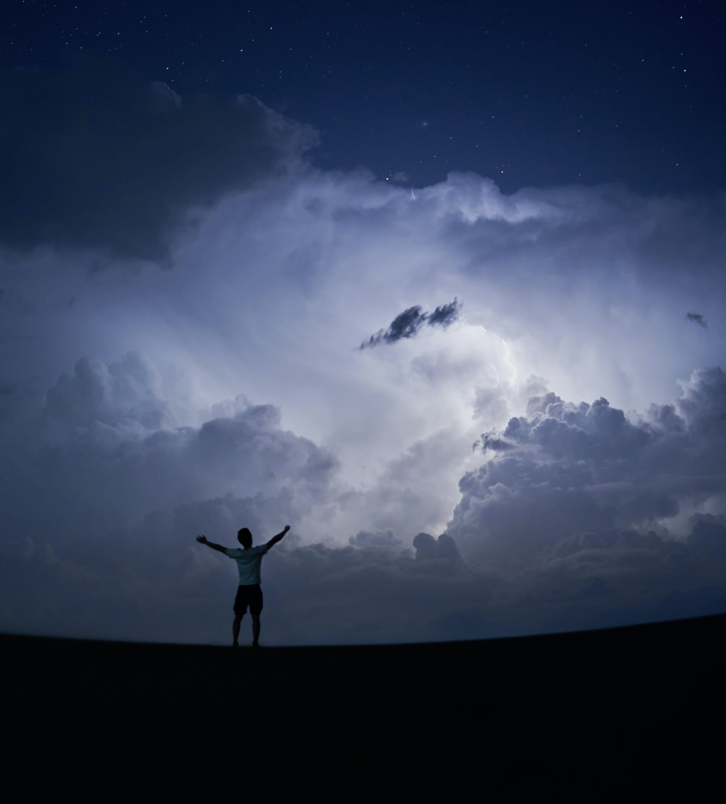 Person standing in a storm