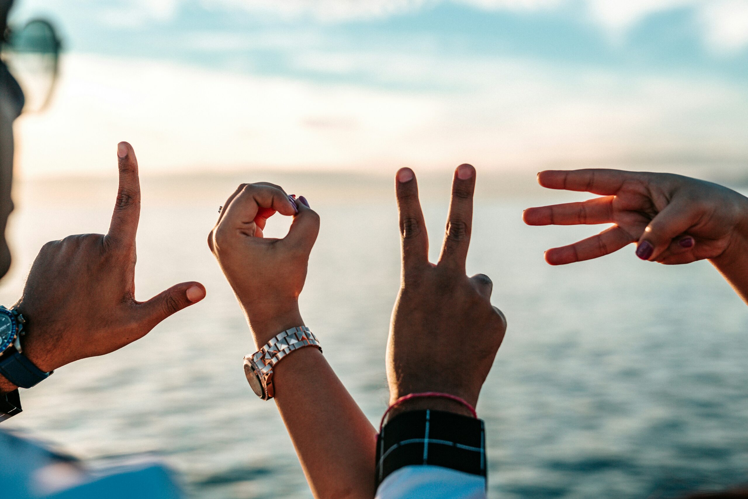 Hands spelling out LOVE