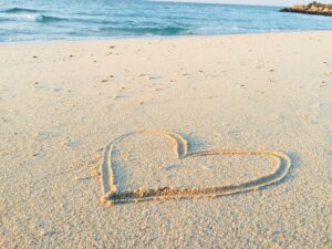 Heart drawn in sand